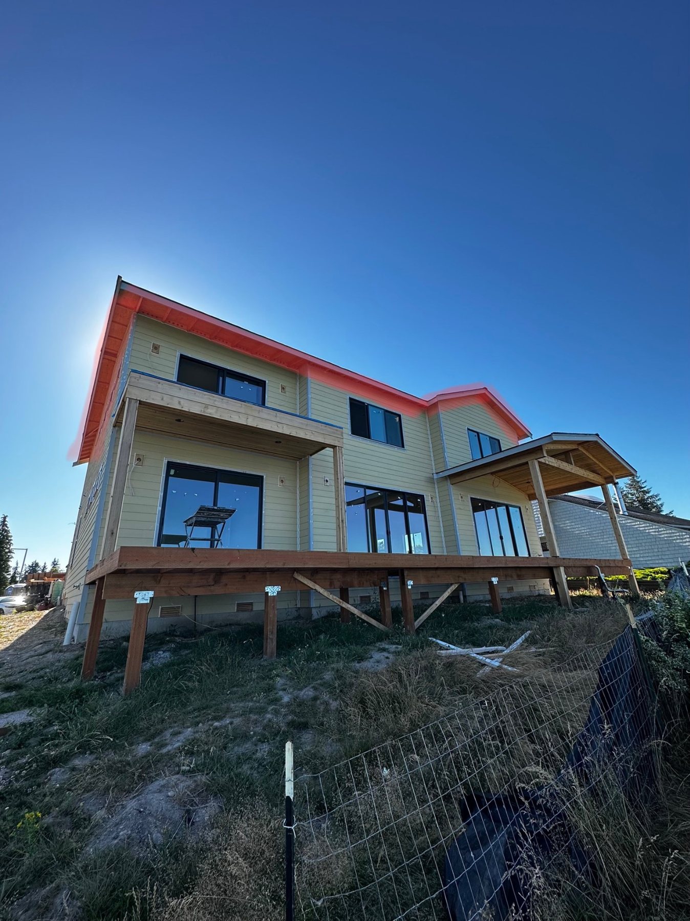 Exterior home with masking and preparation before painting